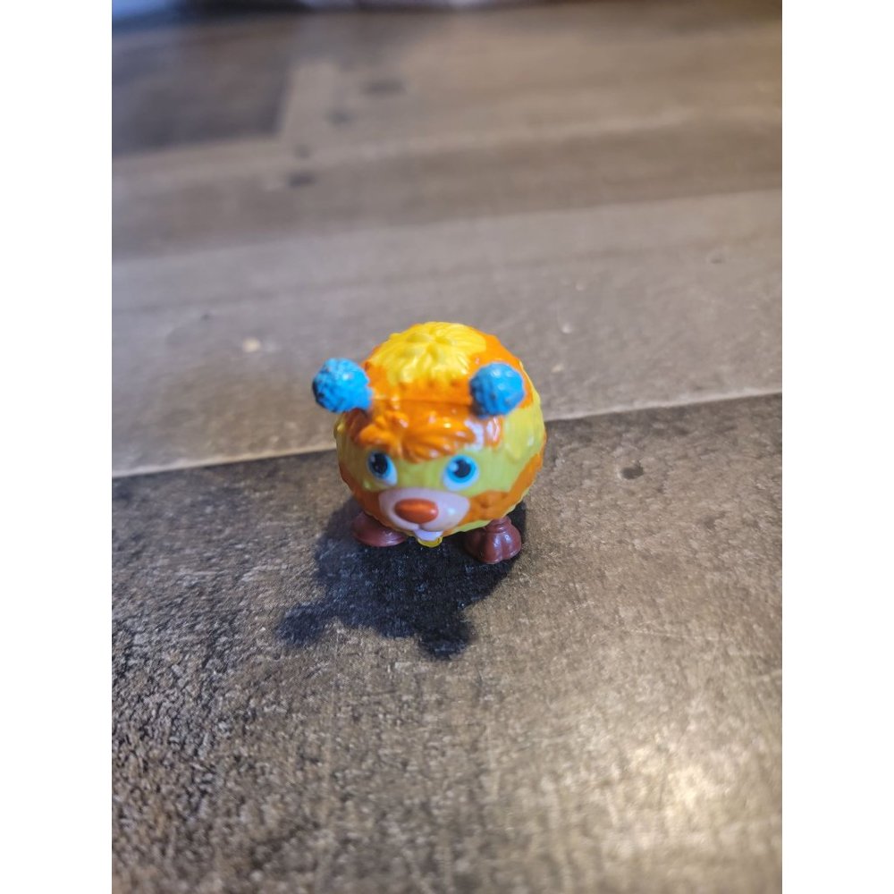 Disney fuzzy orange yellow striped blue ear monster guy toy